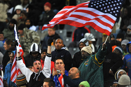 Fans of the U.S.A. cheer for their team during the semifinal match between Spain and the United States at the FIFA Confederations Cup in Bloemfontein, South Africa, June 24, 2009. The United States won 2-0 and advanced to the final. (Xinhua/Xu Suhui)