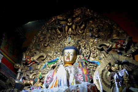 Photo taken on June 25, 2009 shows the figure of Buddha at the Drepung monastery in Lhasa, southwest China's Tibet Autonomous Region. 