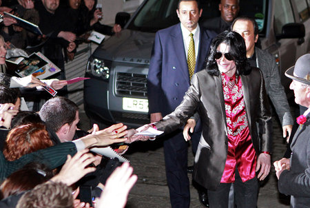 Michael Jackson left his five-star London hotel wearing his bedazzled best. He shook hands with well-wishers on his way out, March 6, 2009.