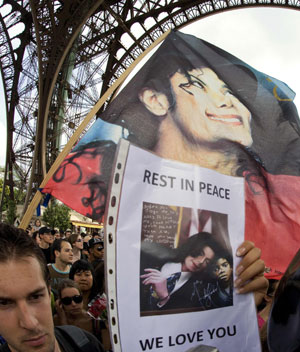 Michael Jackson fans gather near the Eiffel Tower in Paris, June 28, 2009.