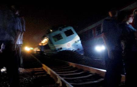 Two passenger trains collided in central China Monday morning, leaving at least three people dead and 60 injured on June 29, 2009.