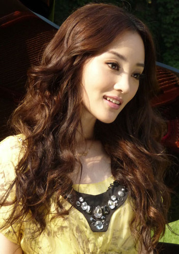 Li Xiaolu: curly haired lady