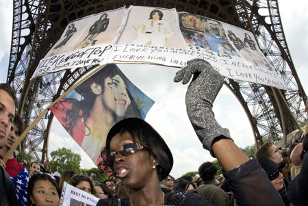 Michael Jackson fans gather near the Eiffel Tower in Paris, June 28, 2009.