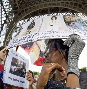 Michael Jackson fans gather near the Eiffel Tower in Paris, June 28, 2009.