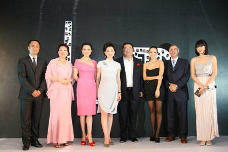 Actresses Zhang Ziyi and Carina Lau attend an opening ceremony of a jewelry accessories store co-run by famous hostess Yang Lan and Canadian pop diva Celine Dion, Sunday, June 28, 2009. 