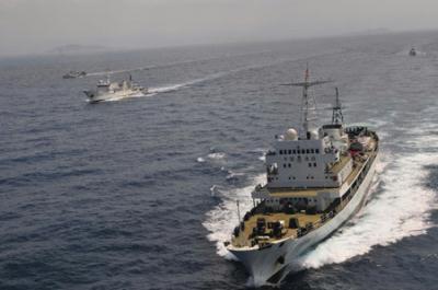 The ships of China Fisheries Administration sail in a formation drilling, during the joint maritime manoeuvre, joint cruise and Voyage Onset Ceremony by maritime police and fisheries administrations. June 30, 2009. [Huang Ju/Xinhua] 