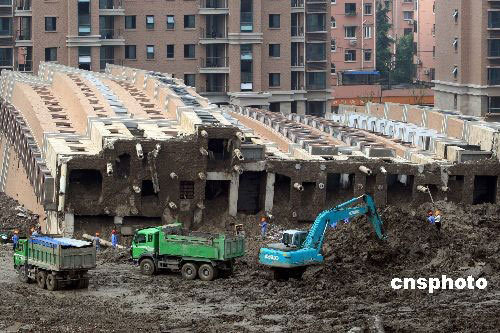 The toppled apartment building on Lianhua Road, Minhang District in Shanghai was seen in this picture taken on June 27, the day when the building collapsed.