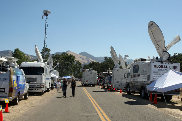 Fans and media congregate outside of Neverland Ranch, the former home of pop icon Michael Jackson, on July 2, 2009 in Los Olivos, California. Jackson died one week ago today. 