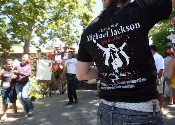 Fans gather outside of Neverland Ranch, the former home of pop icon Michael Jackson, on July 2, 2009 in Los Olivos, California. Jackson died one week ago today. 