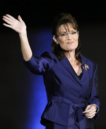 Then U.S. Republican vice-presidential nominee Alaska Governor Sarah Palin waves to the crowd after U.S. Republican presidential nominee Senator John McCain (R-AZ) delivered his concession speech at their election night rally in Phoenix, in this file photo taken November 4, 2008. Palin announced on Friday that she will resign from her post later this month and will not run for re-election as governor. (Xinhua/Reuters Photo) 