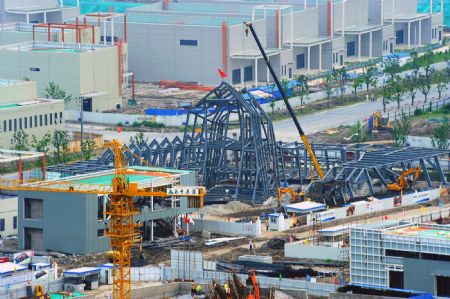 Photo taken on July 4, 2009 shows the Luxemburg Pavilion under construction for the Shanghai 2010 World Expo in Shanghai, east China. The Shanghai 2010 World Expo is to open on May 1, 2010. [Guo Changyao/Xinhua]