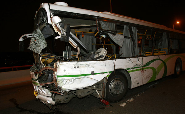 Three people were killed and 14 others injured Sunday night as a bus lost control and entered the opposite lane to collide with more than 10 vehicles on a bridge in Shanghai. The accident occurred at around 9:30 p.m. Sunday on the Yangpu Bridge. [CFP]