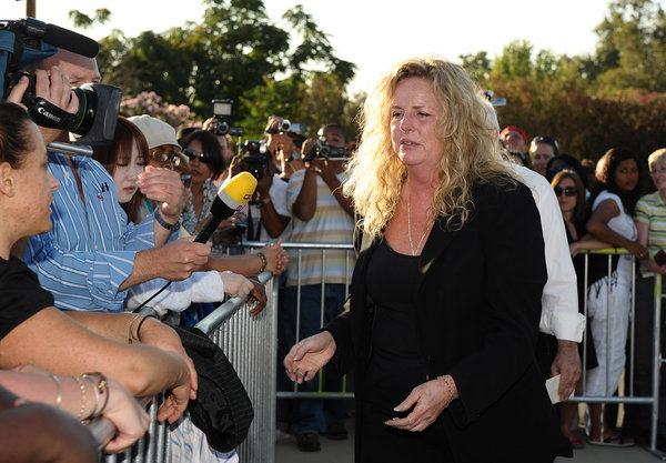 Michael Jackson's hair and makeup artist Karen Faye greets fans at Forest Lawn Cemetery on July 6, 2009 in Los Angeles, California.