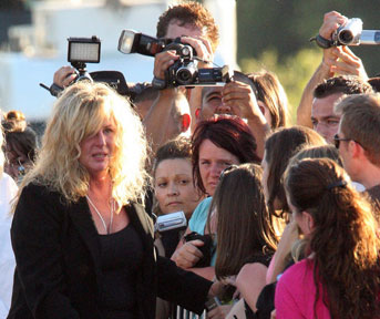 People gather at the Forest Lawn Cemetery