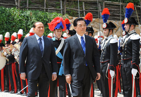 President Hu shortens visit to Italy and goes back home