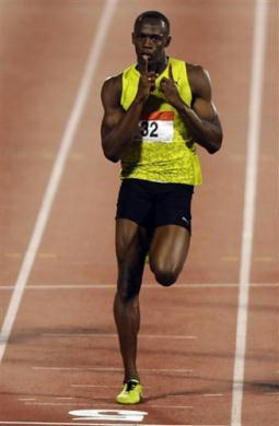 Olympic champion Usain Bolt defied heavy down pour to run the fourth fastest 200 meters time ever to win the Lausanne Grand Prix in 19.59 seconds on Tuesday.