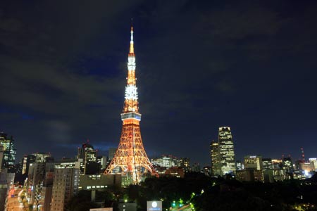 The Tokyo tower decorated with lights of white lamps is seen in Tokyo, capital of Japan, in the photo taken on July 7, 2009. From July 7, Tokyo tower were decked with 180 white energy-saving lamps instead of some of the traditional yellow lamps to illuminate the tower with more 