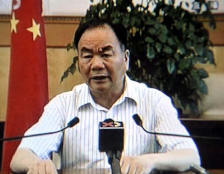 Video frame grab shows Wang Lequan, secretary of the Xinjiang Uygur Autonomous Region Committee of the Communist Party of China (CPC), who is also a member of the Political Bureau of the CPC Central Committee, delivers a televised speech on the riot on July 5 in Urumqi, Xinjiang Uygur Autonomous Region, July 7, 2009. 