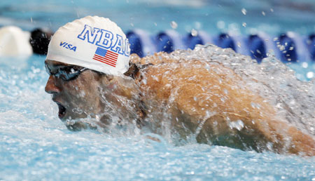 Michael Phelps of the U.S. swims to a win in the men's 200m butterfly final at the USA Swimming National Championships in Indianapolis, Indiana July 8, 2009. (Xinhua/Reuters Photo) 