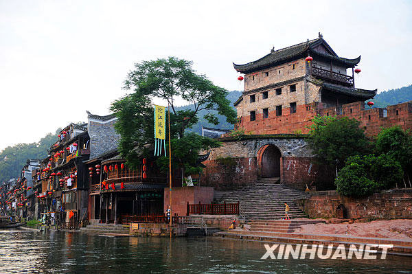 A selection of pictures published on Xinhuanet.com on July 8 exhibit the beauty of the ancient town of Phoenix, which is located in the Phoenix County in the Tujia and Miao ethnic minority Autonomous Prefecture in Hunan province. Built adjacent to the Tuo River, it is a national historical and cultural town with a long history and many places of interest. The town has been named 'the most beautiful whistle stop' in china. [Photo: Xinhuanet]