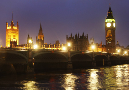 Birthday messages are projected onto the Big Ben clocktower above the Houses of Parliament in London July 11, 2009. Big Ben is the nickname of the bell inside the 96-metre clock tower and it was 150 years ago on July 11, 1859, Big Ben first struck time. [Xinhua/Reuters]