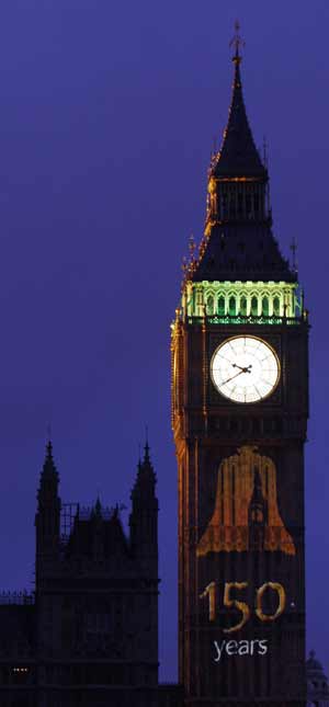 Birthday messages are projected onto the Big Ben clocktower above the Houses of Parliament in London July 11, 2009. Big Ben is the nickname of the bell inside the 96-metre clock tower and it was 150 years ago on July 11, 1859, Big Ben first struck time.[Xinhua/Reuters]