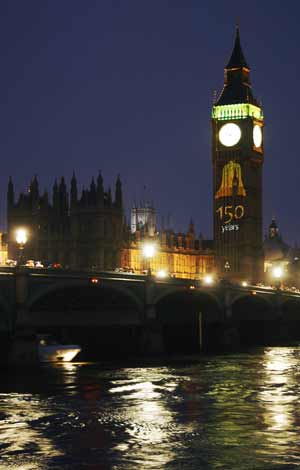 Birthday messages are projected onto the Big Ben clocktower above the Houses of Parliament in London July 11, 2009. Big Ben is the nickname of the bell inside the 96-metre clock tower and it was 150 years ago on July 11, 1859, Big Ben first struck time.[Xinhua/Reuters]