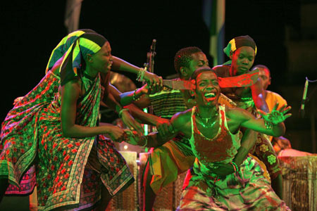 Tanzanian dancers perform during the second Pan African Cultural Festival in Algiers, capital of Algeria, July 13, 2009. [Mahamad/Xinhua]