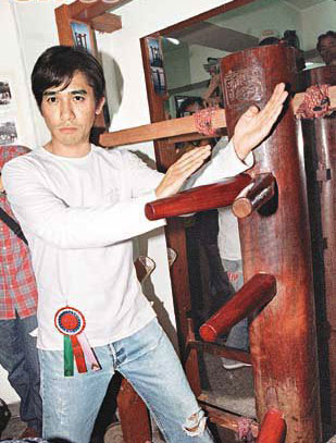 Tony Leung practices kung fu on this undated file photo. 