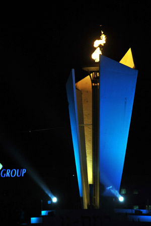The torch is lit up at the opening ceremony of the 18th Maccabiah Games, known as the Jewish Olympics, in Ramat Gan stadium near Tel Aviv, Israel, July 13, 2009. Over 7,000 athletes from 51 countries and regions will take part in the games held every four years since 1932. (Xinhua/Yin Bogu) 