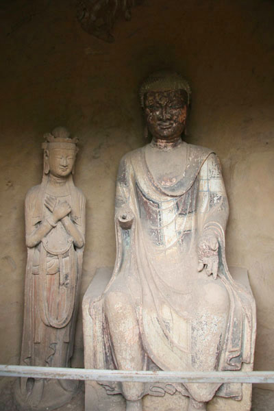 Photos taken on May 2009, shows the sculptures and mural paintings found in the Maijishan grottoes. There are 194 existing caves, in which are preserved more than 7,200 sculptures made from terra cotta and over 1,200 square meters of murals. [Photo: CRIENGLISH.com/ Zhao Lixia] 