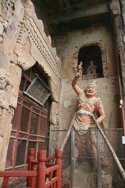 Photos taken on May 2009, shows the sculptures and mural paintings found in the Maijishan grottoes. There are 194 existing caves, in which are preserved more than 7,200 sculptures made from terra cotta and over 1,200 square meters of murals. [Photo: CRIENGLISH.com/ Zhao Lixia]