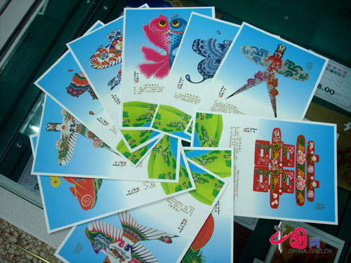 A set of postcards featuring traditional Chinese kites.
