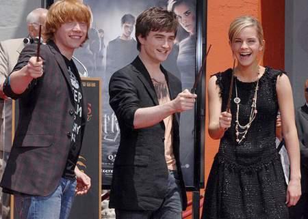 Actors (L-R) Rupert Grint, Daniel Radcliffe and Emma Watson