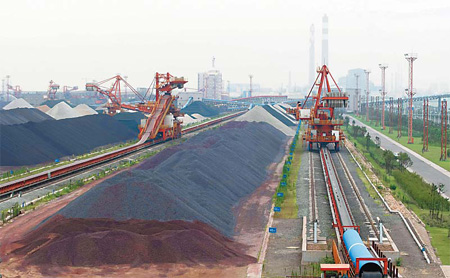 Iron ore stockpiles in Shanghai. A total of 112 steel mills and trading companies in China have iron ore import licenses. CFP