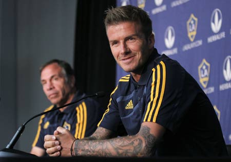 Los Angeles Galaxy soccer player David Beckham attends a press conference in Hoboken, New Jersey, July 15, 2009. Beckham will make his return to MLS league play when the Galaxy play the New York Red Bulls July 16. [Xinhua/Reuters]