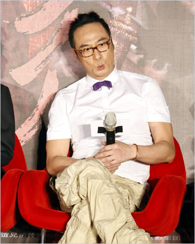 Hong Kong actor and director Francis Ng makes a face to the media at a donation ceremony of his latest comedy 'Tracing Shadow' on Thursday in Beijing.