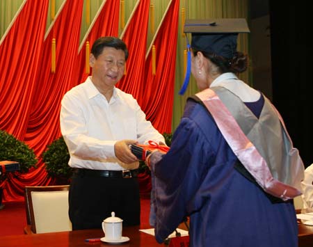 Chinese Vice President Xi Jinping confers certificates on graduates of the spring semester of the Party School of the Communist Party of China (CPC) Central Committee July 16, 2009.
