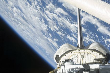 In this photo released by NASA, the Space Shuttle Endeavour's payload bay, the vertical stabilizer and orbital maneuvering system (OMS) pods are featured in this image photographed by a STS-127 crew member from an aft flight deck window July 16, 2009. [Xinhua/Reuters]