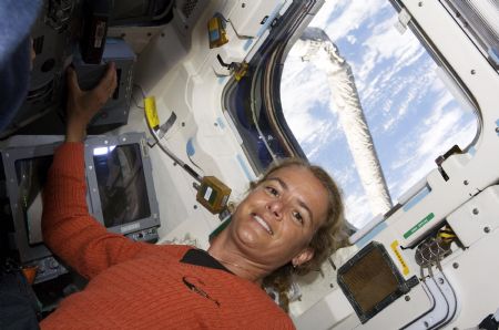 In this photo released by NASA, Canadian Space Agency astronaut Julie Payette, STS-127 mission specialist, is pictured on the aft flight deck of the Space Shuttle Endeavour during flight day two activities July 16, 2009. [Xinhua/Reuters]