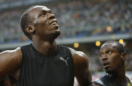 Jamaica's Usain Bolt reacts after winning the men's 100m event of the Paris IAAF Golden League meeting at the Stade de France in Saint-Denis, near Paris. [Zhang Yuwei/Xinhua]