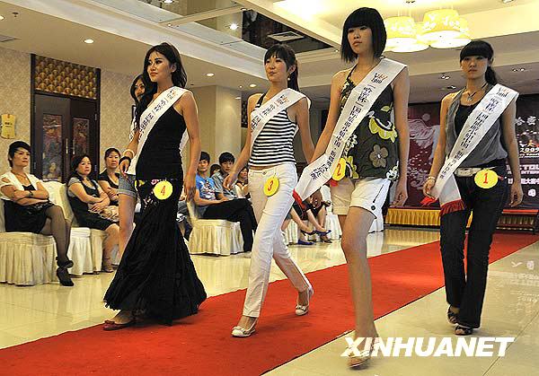 Two weeks after the deadly riot in Xinjiang's capital Urumqi, residents in the far western region seem to have shaken off the shadow of the incident as a beauty contest kicked off on Sunday.