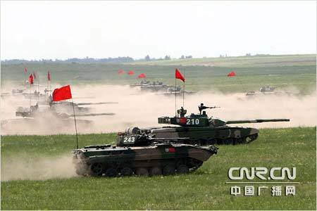 Chinese and Russian armed forces conduct joint military exercises to defend against terrorism on Saturday, July 18, 2009 at a military training base in Shenyang, capital of northeast China's Liaoning Province.