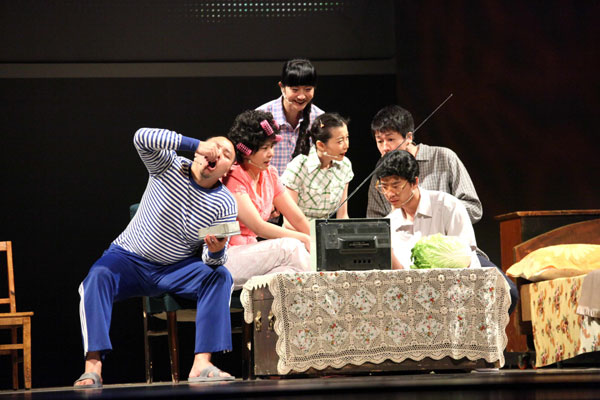 Cast members, including Zhang Jingchu and Lin Yilun, rehearse Stan Lai's play 'Watch TV with Me' in Taipei on July 16, 2009.