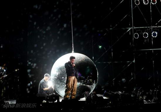 Hong Kong singer Eason Chan gives a concert in Beijing's Workers' Stadium on July 18, 2008. The show is part of his world concert tour 'Eason's Moving On.'