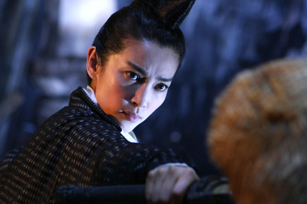 Actress Li Bingbing plays Shangguan Jing'er in the new martial-arts and mystery film 'Detective Dee'. The role is a fictional account of the life of Shangguan Wan'er, a prestigious politician during the Tang Dynasty (618-907 AD). 'Detective Dee', directed by Tsui Hark, features Andy Lau in the lead role of Di Renjie, known as the Sherlock Holmes of ancient China. The film is scheduled for release in October next year.