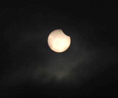 Solar eclipse is seen in this picture taken in Beijing's suburban Huairou District, July 22, 2009. Solar eclipse starts at 8:15 in Yinchuan, Ningxia Hui autonomous region. Scientists said it will be the longest eclipse until the year 2132. [Xinhua].