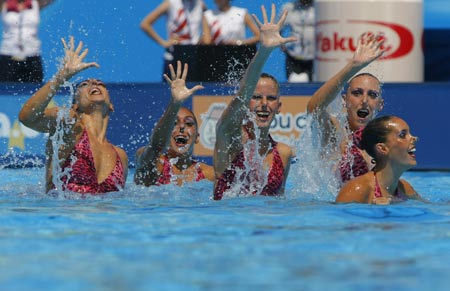 Members of Spain's team compete during the Free Combination Synchronised Swimming Final at the 13th FINA World Swimming Championships in Rome, July 22, 2009. Spain's team won the gold medal with 98.333 points. (Xinhua/Zhang Yuwei)