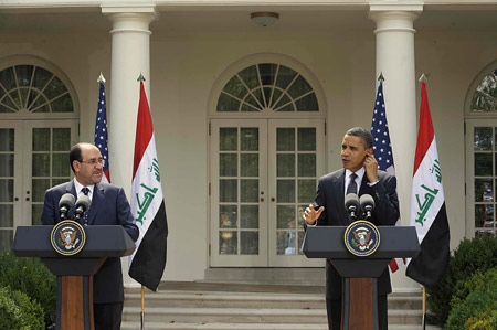 President Barack Obama on Wednesday reiterated that the U.S. troops will completely withdraw from Iraq by the end of 2011 as scheduled, and that the United States supports Iraq's political reconciliation process.