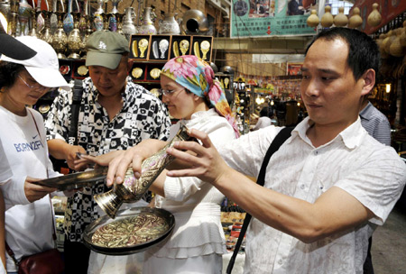 Urumqi&apos;s Int&apos;l Bazaar reopens after deadly riot